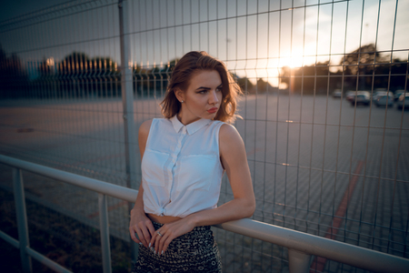 Beautiful fashion woman with  blond hair  and make up posing onの写真素材