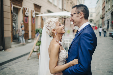 wedding couple  posing in cityの写真素材