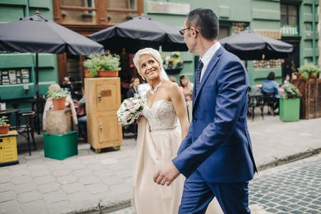 wedding couple  posing in cityの写真素材