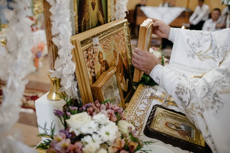 Altar in church with priest performの写真素材