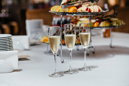 full glasses of champagneの写真素材