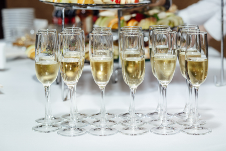 full glasses of champagneの写真素材