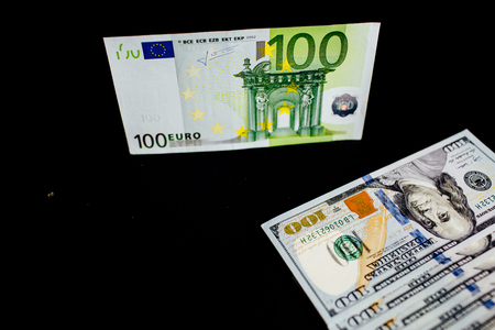 Close-Up of american US dollars and eurosの写真素材