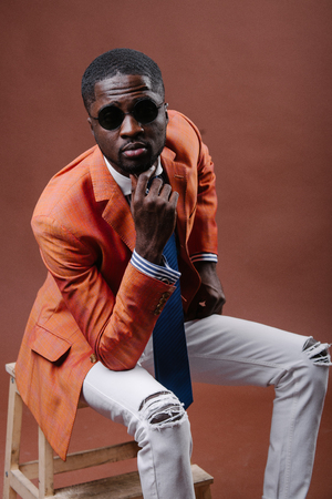 Studio fashion portrait of a handsome young African American businessmanの写真素材