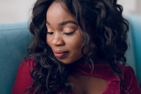 Fashion portrait of young beautiful african american womanの写真素材