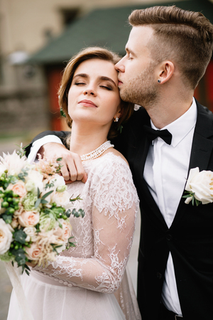 Wedding couple together close to each otherの写真素材