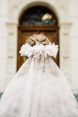 Bride with wedding makeup and hairstyle. Smiling bride. Wedding