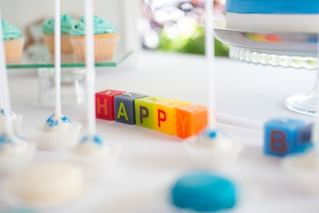 happy candle on desserts buffet