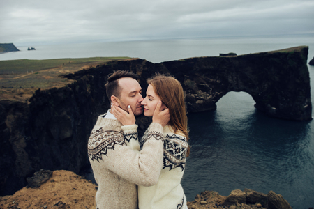 Amazing romantic view of happy couple near beautiful grand waterの写真素材