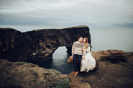 Amazing romantic view of happy couple near beautiful grand waterの写真素材