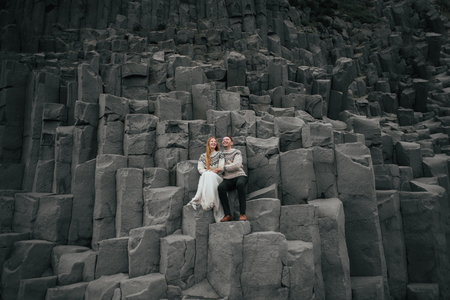 Amazing romantic view of happy couple near beautiful grand waterの写真素材