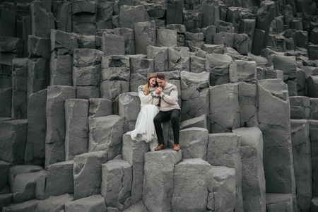 Amazing romantic view of happy couple near beautiful grand waterの写真素材