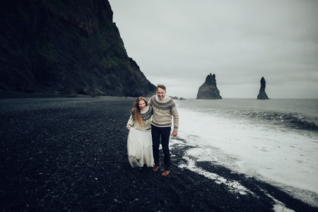 Amazing romantic view of happy couple near beautiful grand waterの写真素材
