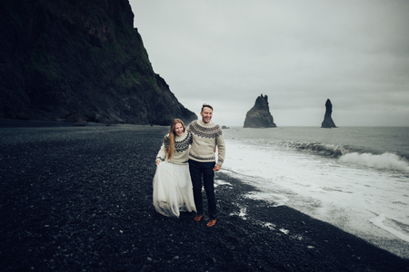 Amazing romantic view of happy couple near beautiful grand waterの写真素材