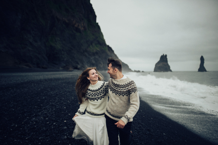 Amazing romantic view of happy couple near beautiful grand waterの写真素材
