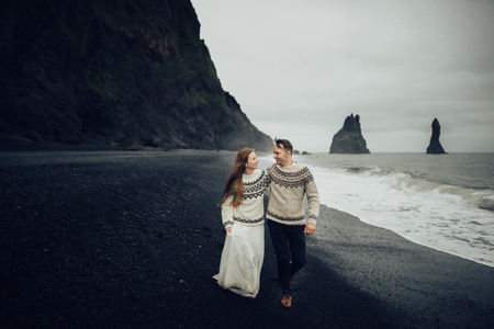 Amazing romantic view of happy couple near beautiful grand waterの写真素材