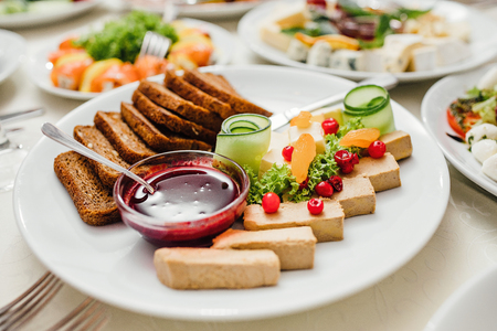 Beautifully decorated catering banquet table with different foodの写真素材