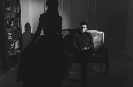 Closeup portrait of a sensual woman seducing her handsome loverの写真素材