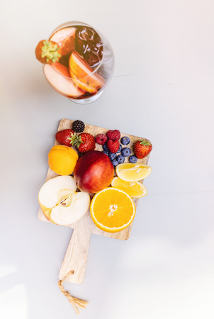 Top view of summer drinks, fruit cocktails on white wood tableの写真素材