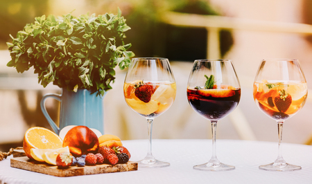 Top view of summer drinks, fruit cocktails on white wood tableの写真素材
