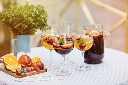 view of summer drinks, fruit cocktails on white wood tableの写真素材