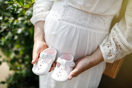 Waiting of baby. Pregnant woman, pregnancy, motherhood. Happy family. Mom's, Dad's and baby's...