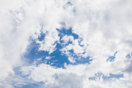 Blue sky background with tiny clouds.の写真素材