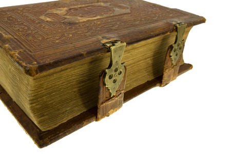 leather brown old book with yellow lock, isolated on whiteの写真素材