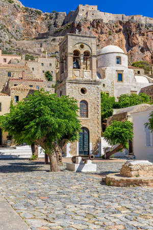 Traditional architecture with the  bell tower of Elcomenos Christos in the main square  of the medieval  castle of Monemvasia, Lakonia, Peloponnese, Greeceのeditorial素材