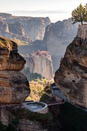 The entrance of Varlaam monastery, located on a unique rock formation  above the village of Kalambaka during fall season.の写真素材