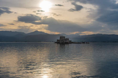Vew of the historical  Venetian water castle of Bourtzi located in  the old harbour of Nafplio Argolis Greece.のeditorial素材