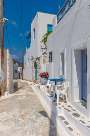 Traditional cycladitic alley with a narrow street and whitewashed  houses  in Tholaria, Amorgos  Greeceの写真素材