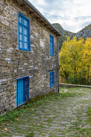 The picturesque village of Tsepelovo during fall season with its architectural traditional old stone  buildings located on Tymfi mount, Zagori, Epirus, Greece, Europeのeditorial素材