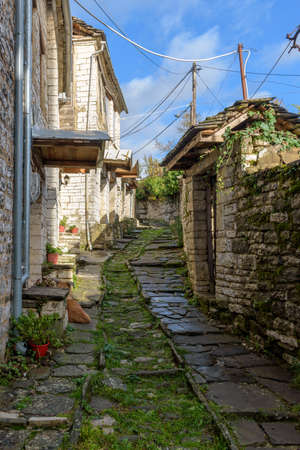 The picturesque village of Dilofo during fall season with its architectural traditional old stone  buildings located on Tymfi mount, Zagori, Epirus, Greece, Europeのeditorial素材
