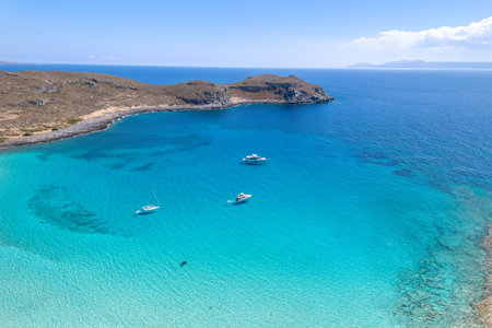 Aerial view of Simos beach in Elafonisos. Located in south  Peloponnese elafonisos is a small island very famous for the paradise sandy  beaches and the turquoise waters.の写真素材