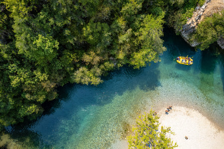 aerial view of a rafting boat and athletes in river Voidomatis with the famous clear waters in epirus Greece.の写真素材