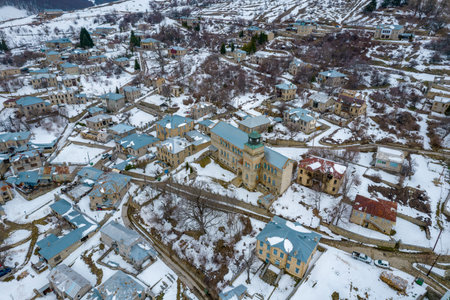 Aerial view of traditional architecture  with  stone buildings during  winter season in the picturesque village of Nymfaio  Florinas Greeceの写真素材