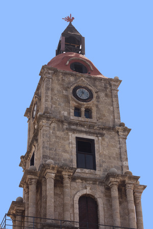 Old Clock Town Church tower of Rhodes, Greece の写真素材