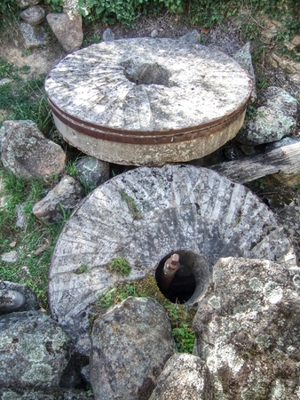Old mill with millstones. Way of the mills. Hoyo de Pinares.  Avila.  Spain.の写真素材