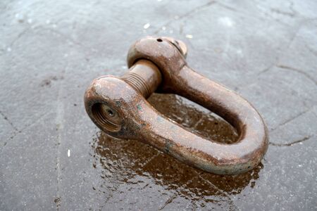 Metal fastener on iceの写真素材