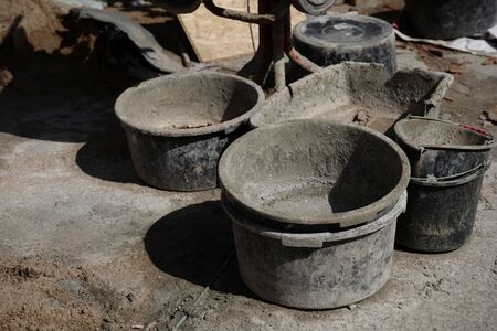 Dirty plastic buckets