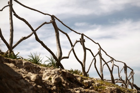 Old fence on the mountainの写真素材