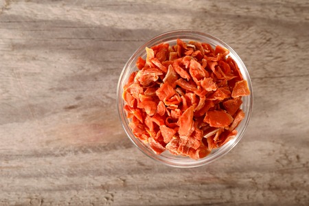 Dried carrot slices in a bowlの写真素材