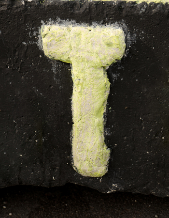 Letter T. On black backgroundの写真素材