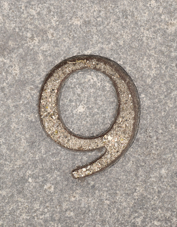Number 9 on stony wallの写真素材