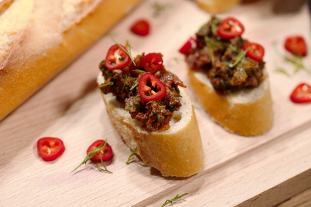 Toasted bread with tomatoesの写真素材