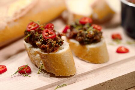 Toasted bread with tomatoesの写真素材