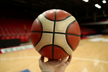 Man holding basketballの写真素材