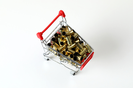 Gun bullets in shopping cartの写真素材