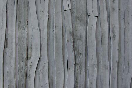old gray wooden plank fenceの写真素材